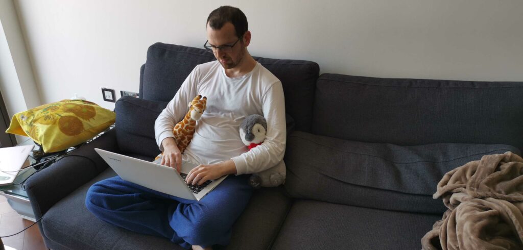 Ayal balancing work and life from his sofa